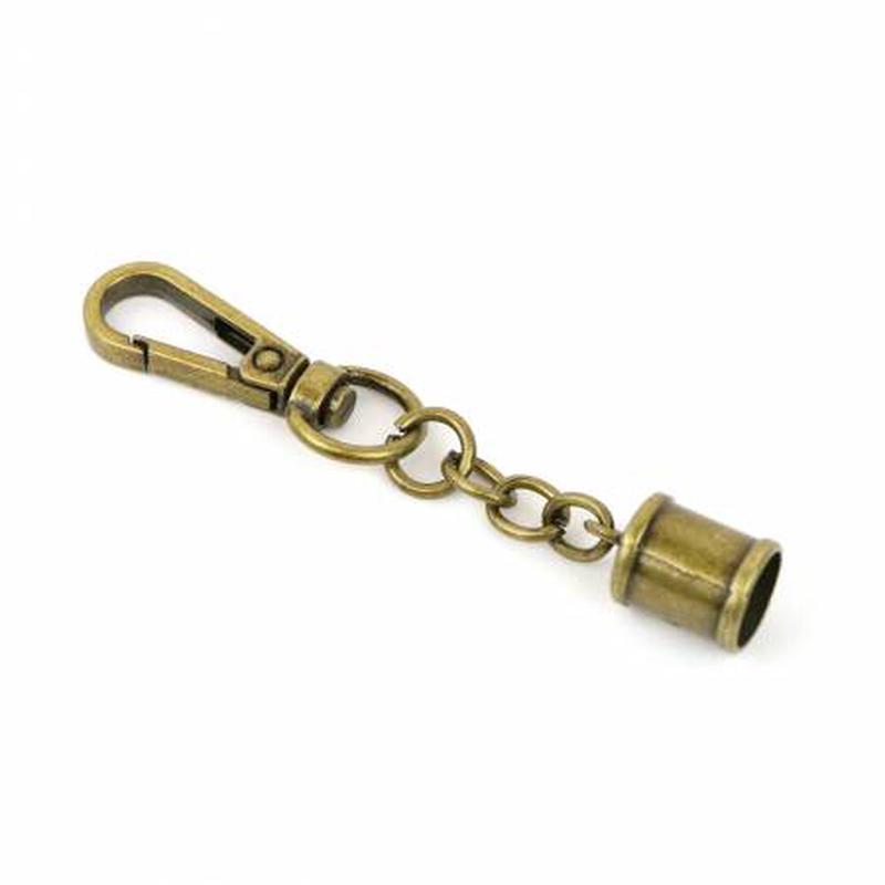 (2) Tassel Caps Antique